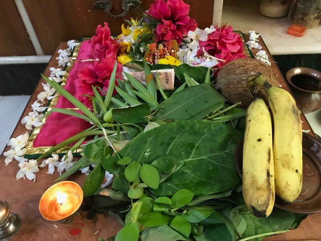 ganesh puja with 21 leaves